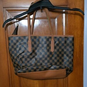 Beautiful vegan tote fifteen inches wide nine inches tall.